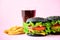 Fast food frame. Delicious meat burgers on pink background. Take away meal. Unhealthy diet concept with copy space