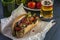 Fast food: hotdog, beer bottle and glass