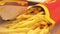Fast food from McDonald\\\'s. Close-up woman\\\'s hands take french fries