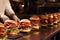 Fast food order preparation chef burgers cooking meat steak meal restaurant indoor service employees working hamburger