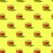 Fast food pattern plastic burger on a yellow background