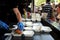 Fast food preparation of hamburger in an outdoor market in London England