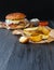 Fast food restaurant dish. Hamburger and fries wedges