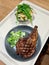 Fast Food Veal Chop with Salad served with Tray at Restaurant.