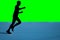 Fast marathon runner silhouette with green background
