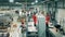 Fast motion of factory technicians assembling refrigerators