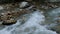 A fast mountain river with rapids in the gorge. Views of the mountain river.