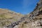 Fast mountain stream tumbling between cliffs in a valley Lake District, UK