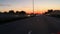 Fast movement in the evening at sunset on the highway.