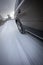 Fast moving car on a  snowy road