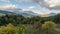 Fast moving clouds in autumn morning landscape. Night to day Time lapse