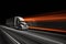 Fast moving full lighted truck on highway with semi-trailer