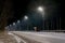 Fast moving traffic at night. winter season. concept of the road, snow and ice removal, danger and safety of movement, street