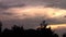 The fast passing of clouds in the sky before a thunderstorm.