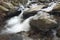 Fast running stream through large boulders near Boone North Carolina