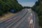 Fast traffic speeding along the M40 motorway in Buckinghamshire. Light trails from long exposure.