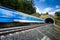 Fast train passing through a tunnel on a lovely summer day