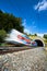 Fast train passing through a tunnel on a lovely summer day