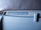 Faster seat belt while seated warning posted on back of airline seat