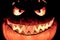 Fat big halloween pumpkin smile with hot burning fire eyes mouth