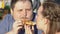 Fat boyfriend and girlfriend eating pizza outdoors romantic date, junk food diet