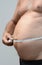 Fat male stomach tape measure