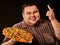Fat man eating fast food pizza . Breakfast for overweight person.