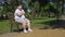 Fat man having heart attack when jogging in park, obesity causes health problems