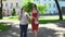 Fat and slim female friends walking park and talking, body contrast, diet