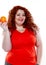 The fat woman with orange juice vegetable fruit holding isolated