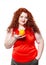 The fat woman with orange juice vegetable fruit holding isolated