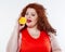 The fat woman with orange juice vegetable fruit holding isolated