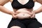 Fat woman squeeze belly obese wearing black underwear bra and pa