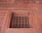 FATEPHUR SIKRI, INDIA- MARCH, 27, 2019: intricate carved stone window grille on an ancient mughal palace