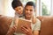 Father, boy and child with tablet on sofa for online games, reading ebook story and elearning multimedia. Man, dad and