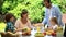 Father bringing just delivered pizza to hungry family, smelling fragrant food