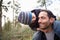 Father Carrying Son On Shoulders During Countryside Walk