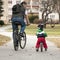 Father and child cycling