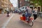 Father with a child in the freight bicycle. Amsterdam, Netherlands.