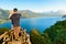 Father with child look at amazing tropical lake in mountains