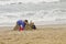 Father and Child Playing on Beach