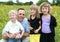 Father and Children in Flower Field