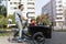 Father and children having a ride with cargo bike