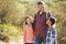 Father And Children Hiking In Countryside