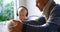 Father and children listening to music on headphones 4k