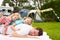 Father With Children Relaxing On Camping Holiday