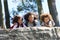 Father And Children Resting On Hike Through Countryside