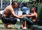 A father comforts his son after he lost his bout at the Kirkpinar Turkish Oil Wrestling Festival at Edirne in Turkey.
