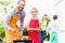 Father and daughter barbecue together