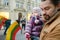 Father and daughter with a flag of Lithuania